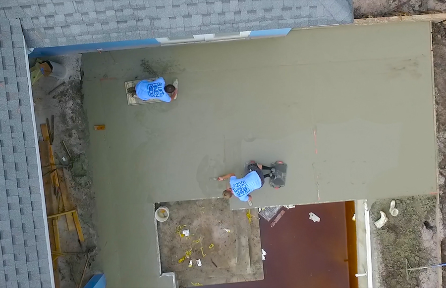 crew installing concrete deck