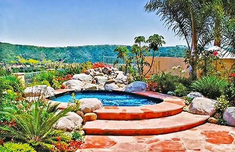 custom-inground-spa-with-rock-waterfall.jpg