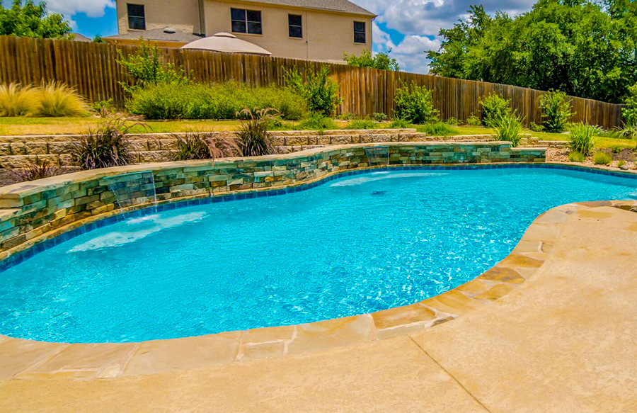 free-form-pool-with-stone-clad-raised-wall