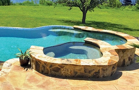 Free Form Concrete Pool Spa with flagstone Free Form Concrete Pool Spa with flagstone