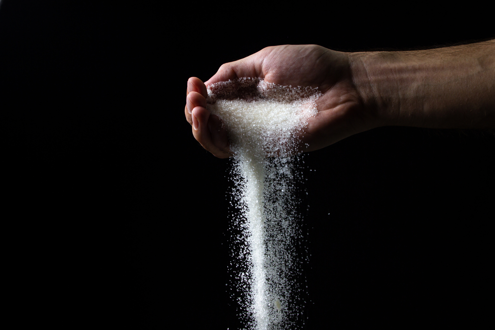 hand-pouring-salt
