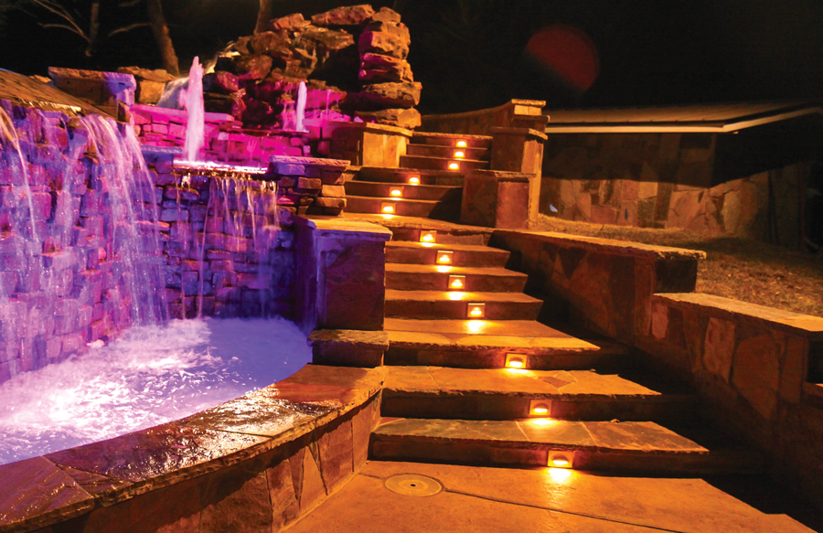 illuminated-deck-steps-by-pool-at-night