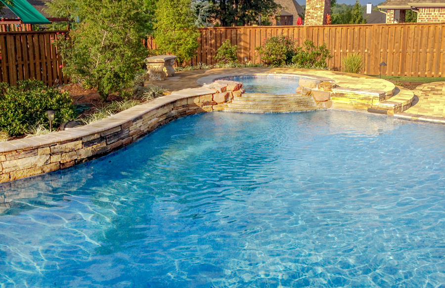 pool-spa-with-stone-covered-raised-beam