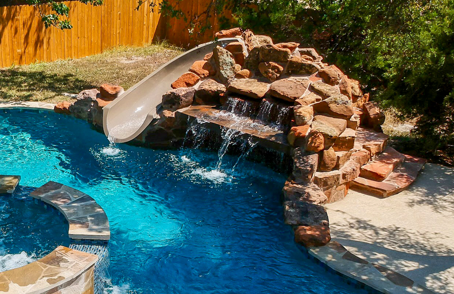 small-grotto-waterfall-slide-on-free-form-pool