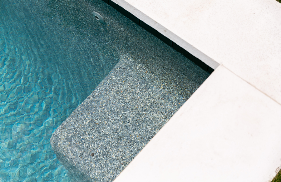 swimming-pool-bench-with-pebble-finish