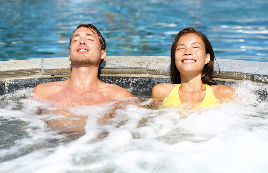 young-couple-enjoying-spa-hydrotherapy